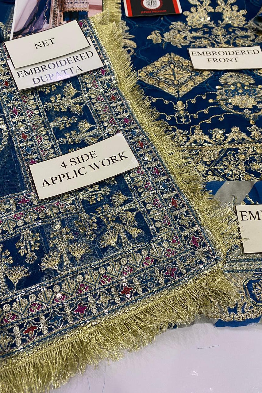 Embroidered fabric with labels indicating design details on a blue background