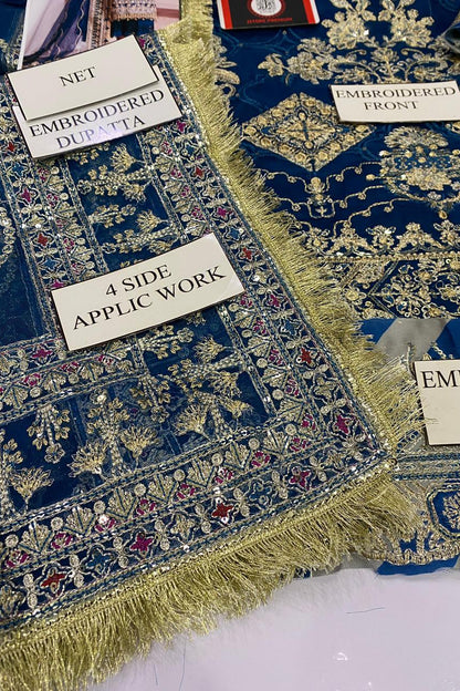 Embroidered fabric with labels indicating design details on a blue background